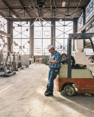 A Worker Reading A Chart - Workers Compensation Attorney -Boxer & Gerson, LLP